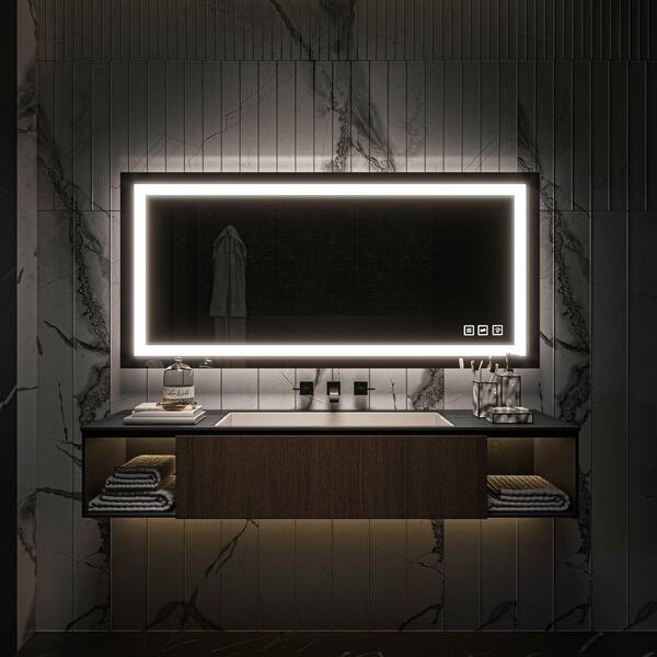https://images.thdstatic.com/productImages/b34e85c5-008e-419a-a31f-30b07c0feff6/svn/bulit-in-double-led-light-strip-toolkiss-vanity-mirrors-tk19088-31_600.jpg