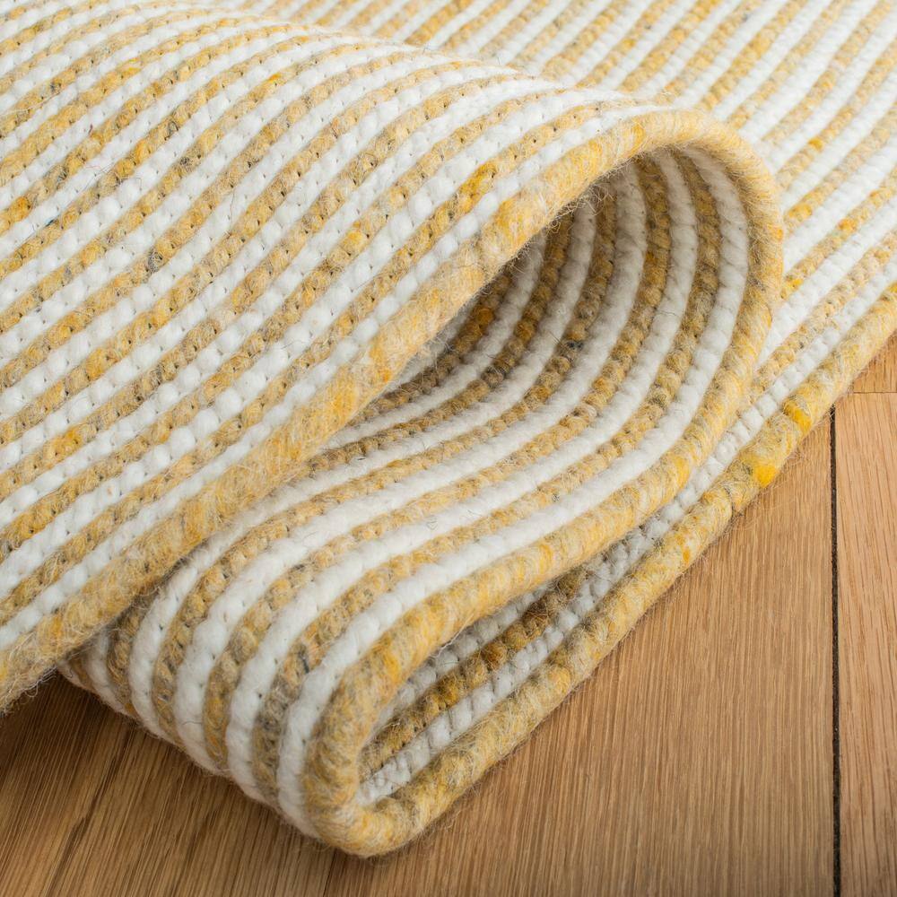 Handmade Gold and Ivory Round Wool Braided Area Rug