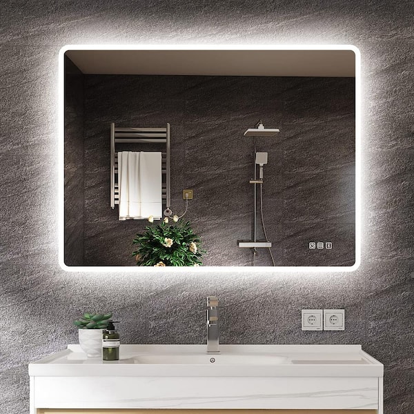 https://images.thdstatic.com/productImages/b38fdb94-1372-4ab8-a09f-ad9399730e24/svn/glass-kinwell-vanity-mirrors-ucm3017-6080-64_600.jpg