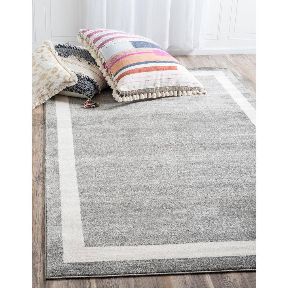 Modern Gray and Ivory 6' x 9' Tufted Synthetic Area Rug