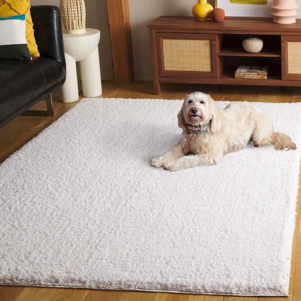 SAFAVIEH Rumi Shag 9 ft. x 12 ft. Ivory Modern Solid Area Rug