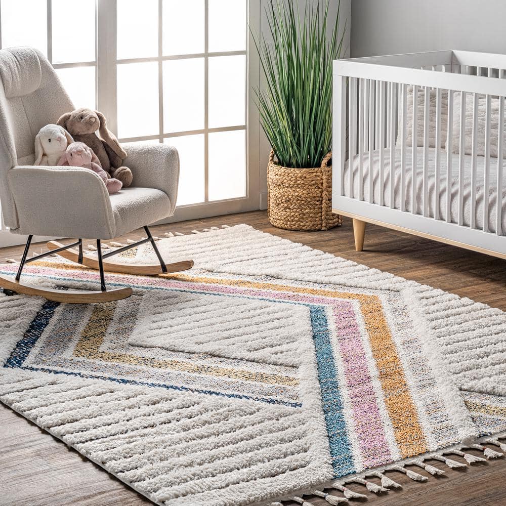 Ivory Geometric Synthetic Rectangular Area Rug with Braided Tassels