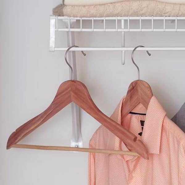 https://images.thdstatic.com/productImages/b3d64df0-ee2a-490c-a52b-e0fd08331f61/svn/brown-household-essentials-hangers-26142-1f_600.jpg