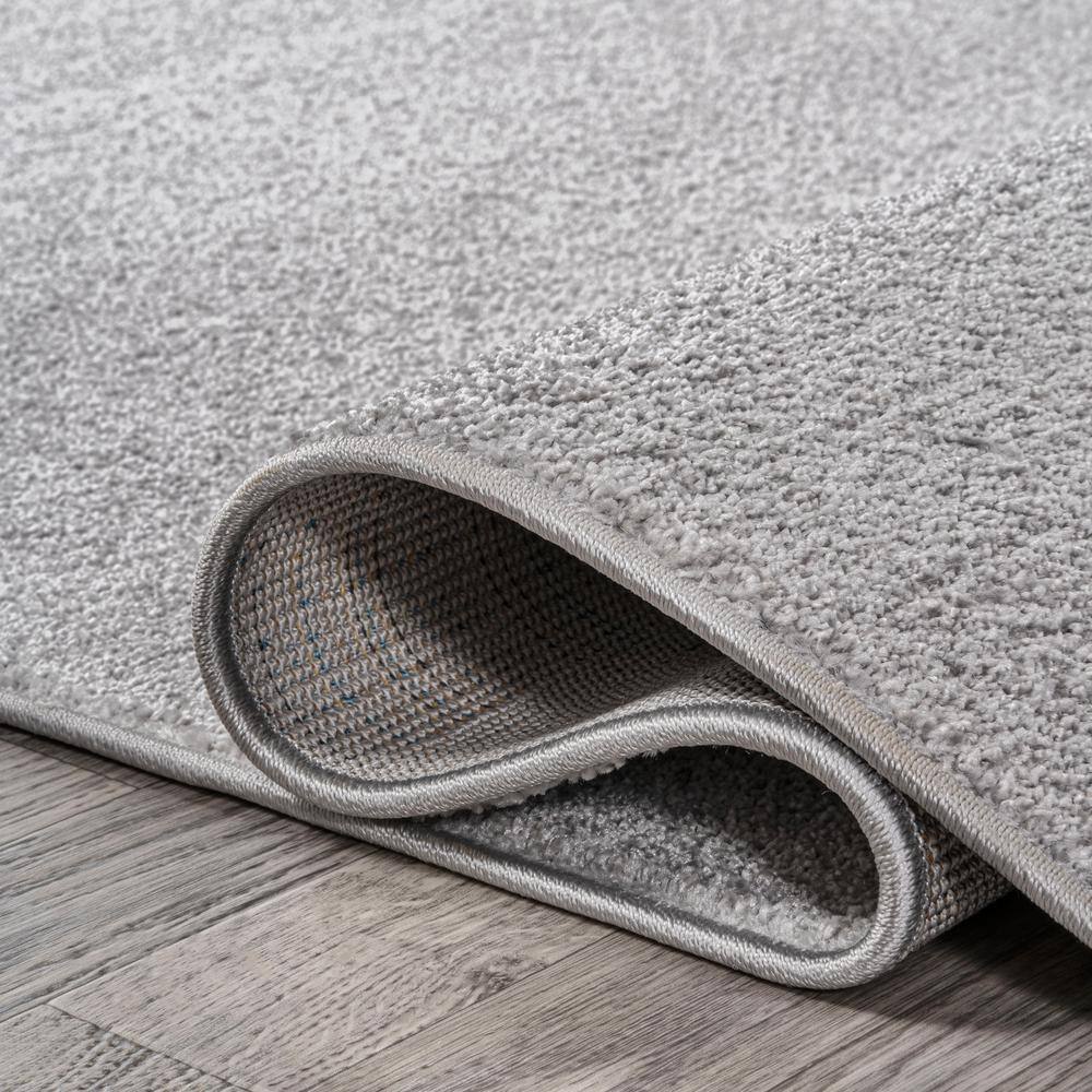 Light Gray 12' x 15' Solid Synthetic Low-Pile Area Rug