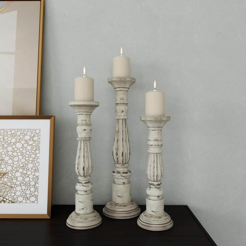 Distressed White Mango Wood Candle Holder Set, 21" 17" 15"