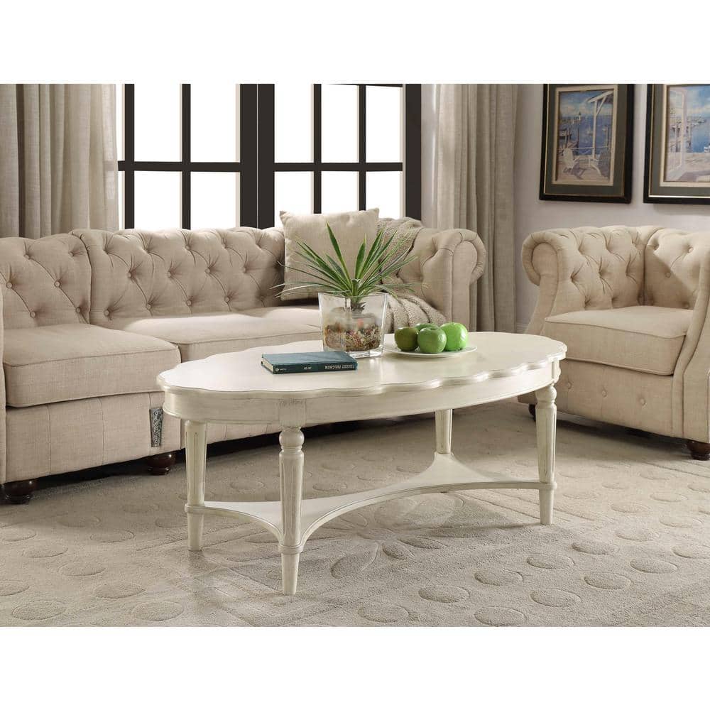 Fordon Antique White Oval Wood Coffee Table with Bottom Shelf