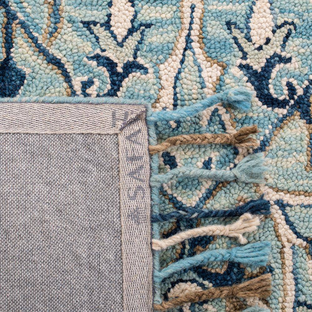 Blue and Ivory Floral Wool 9' x 12' Area Rug