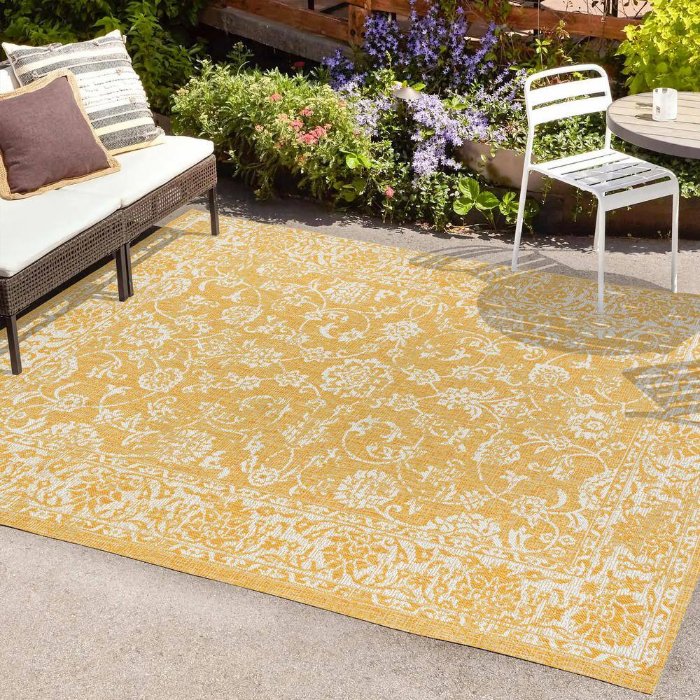 9' x 12' Yellow and Cream Floral Synthetic Rectangular Rug
