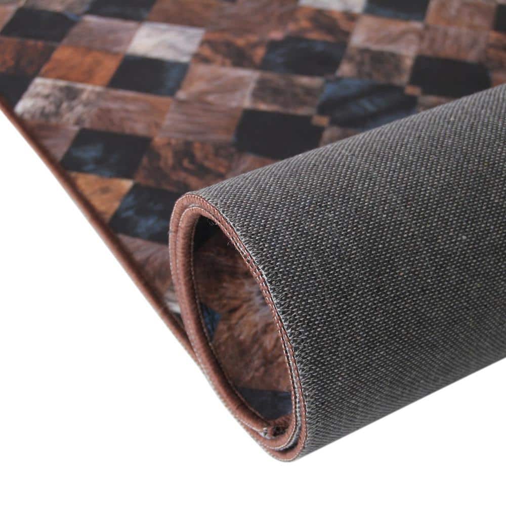 6' x 9' Black and Brown Faux Cowhide Area Rug