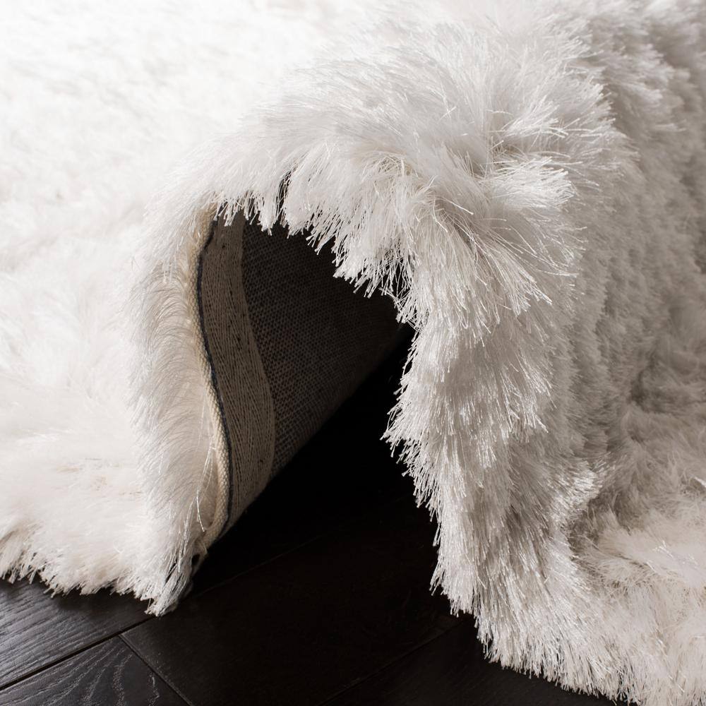Ivory Hand-Tufted Shag Synthetic 9' x 12' Area Rug