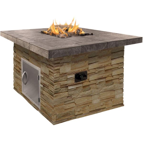 Cal Flame 48 in. Natural Stone Propane Gas Fire Pit in Brown with Log Set and Lava Rocks