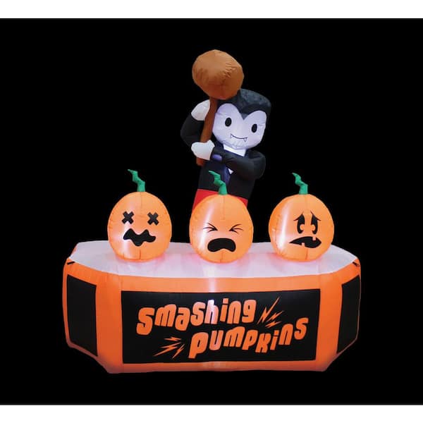 60.63 in. H x 29.53 in. W x 61.42 in. L Halloween Inflatable Smashing  Pumpkins HC-43821 - The Home Depot