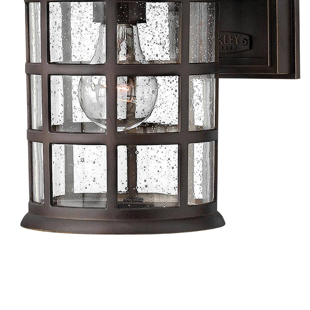 Freeport Classic Bronze Outdoor Wall Sconce with Clear Seedy Glass