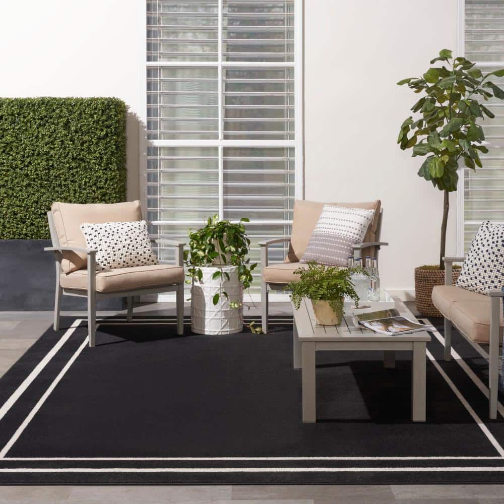 Reversible Black Ivory Synthetic 9' x 12' Area Rug