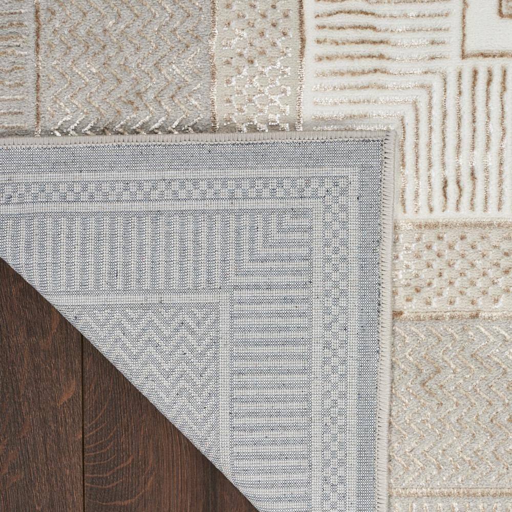 Ivory Geometric 8' x 10' Synthetic Rectangular Area Rug