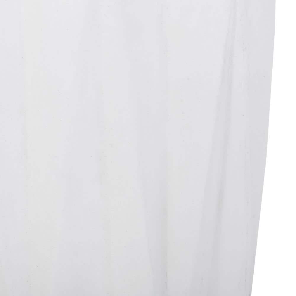Close-up of the antique white table surface.