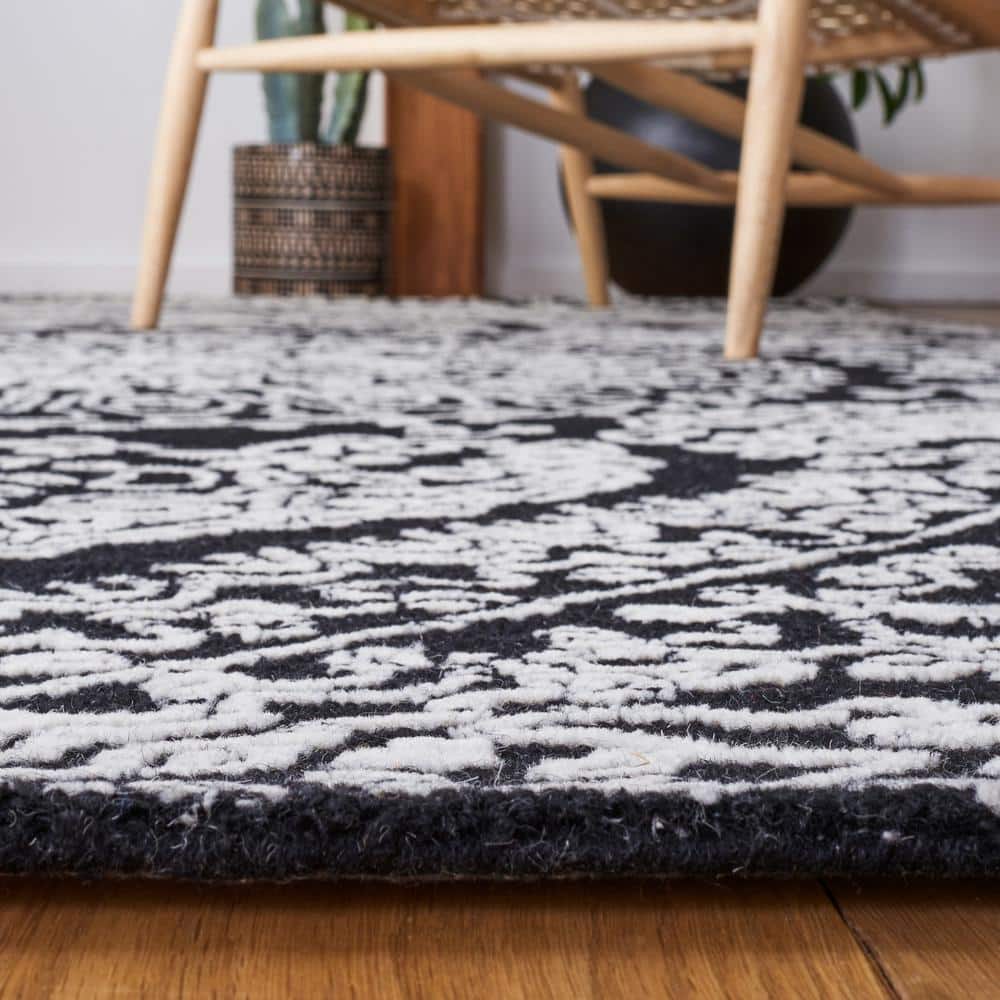 Black and Ivory Floral Hand-Tufted Wool 6' x 9' Area Rug