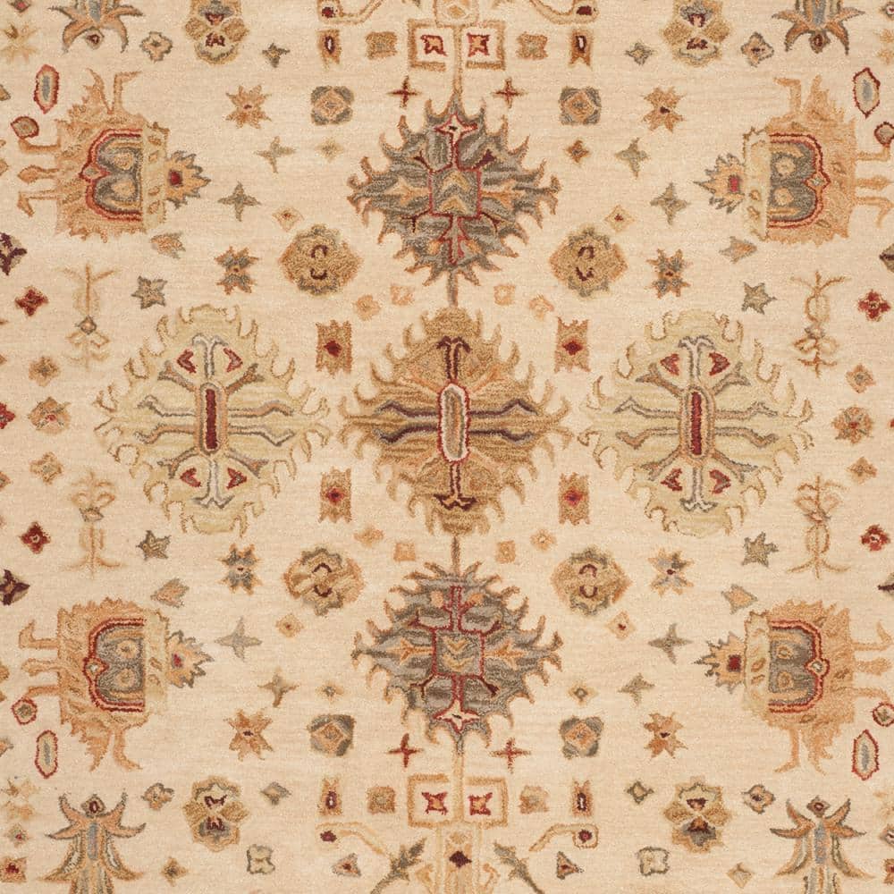 Ivory and Green Handmade Wool Tufted 8' x 10' Area Rug