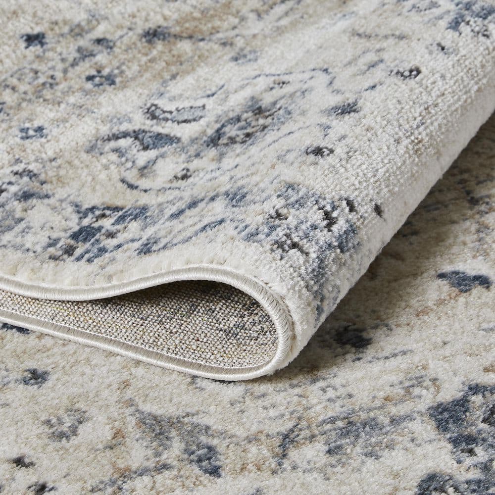 Kehleigh Aylesh 9' x 12' Blue and Cream Synthetic Area Rug