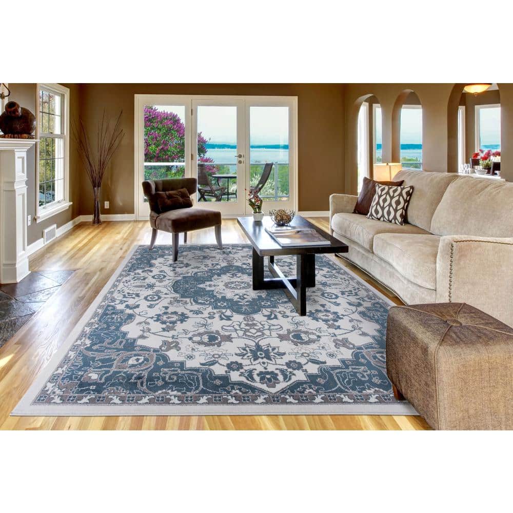 Ivory and Blue Medallion Synthetic 8' x 10' Area Rug