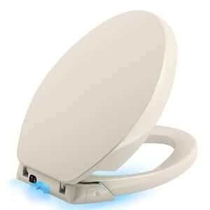 Purefresh Elongated Closed Front Toilet Seat in Biscuit