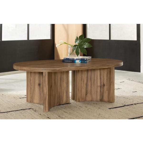 Signature DESIGN BY ASHLEY Austanny 52 in. Brown Oval Wood Coffee Table