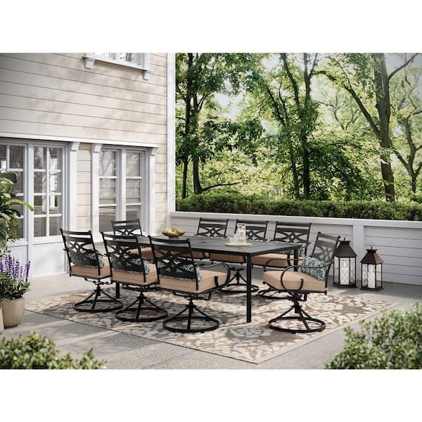 Hanover Montclair 9-Piece Steel Outdoor Dining Set with Tan Cushions, 8 Swivel Rockers and 42 in. x 84 in. Table