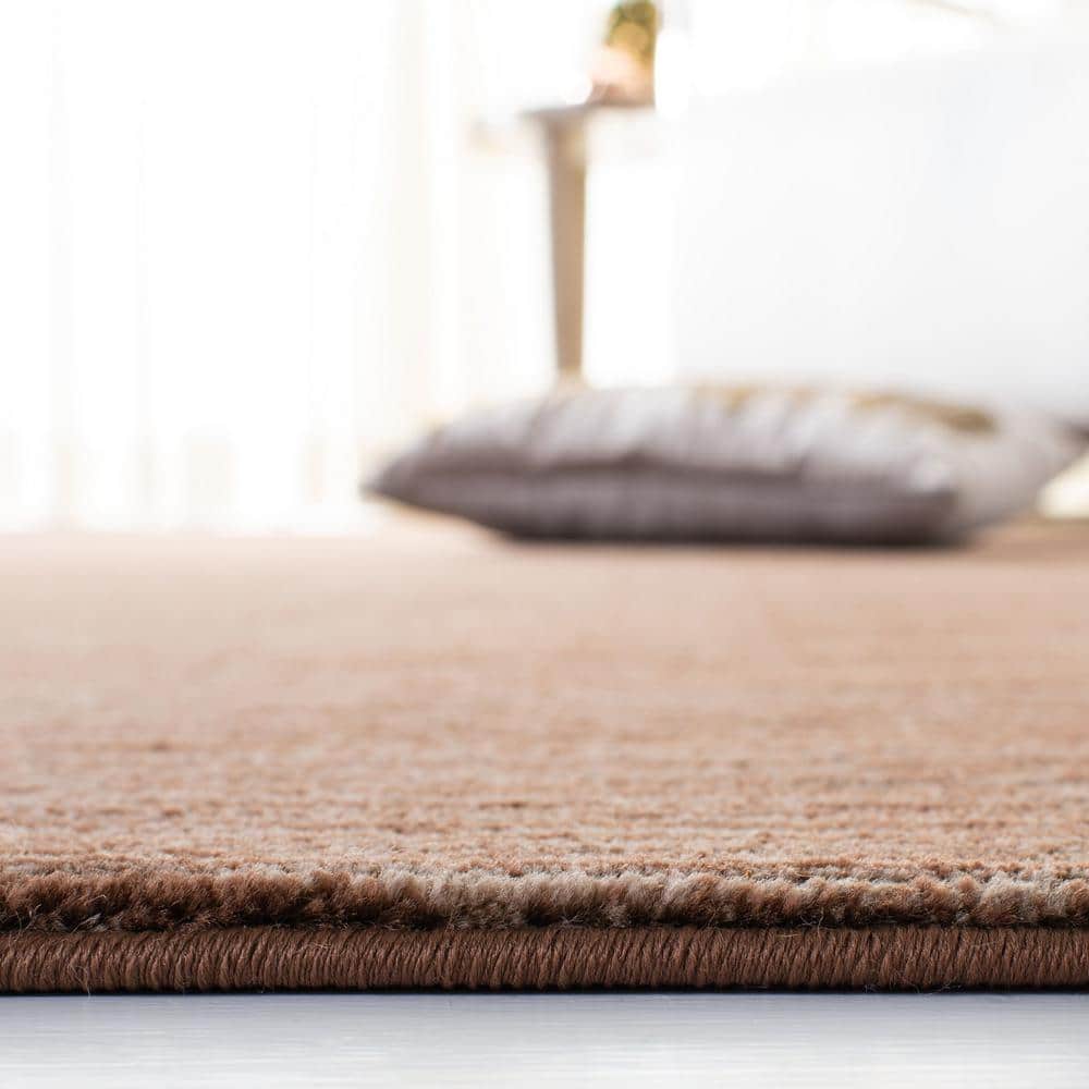 https://images.thdstatic.com/productImages/b4e0f13d-48dd-4e15-b3d4-ee5b5a9c5047/svn/brown-safavieh-area-rugs-vsn606e-7sq-4f_1000.jpg