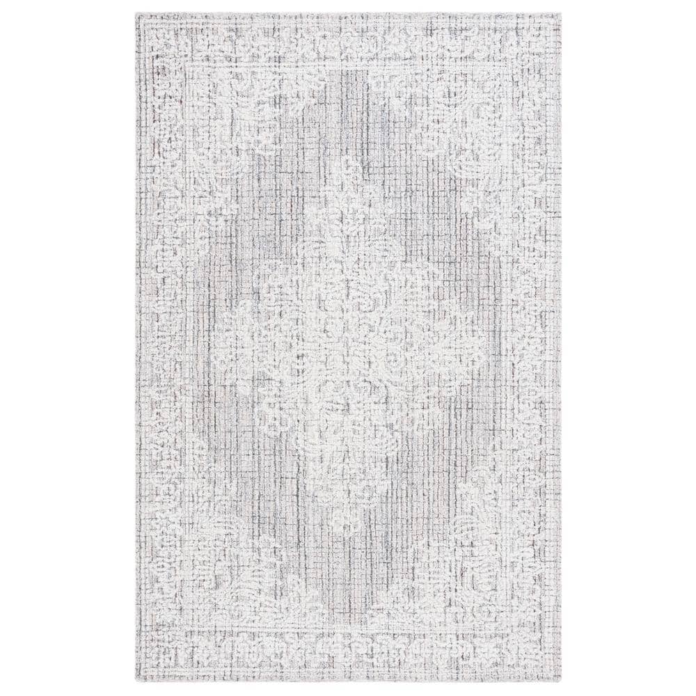 Ebony 6' x 9' Brown and Ivory Wool Tufted Area Rug