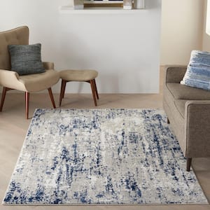Cyrus Ivory/Navy 5 ft. x 7 ft. Abstract Contemporary Area Rug