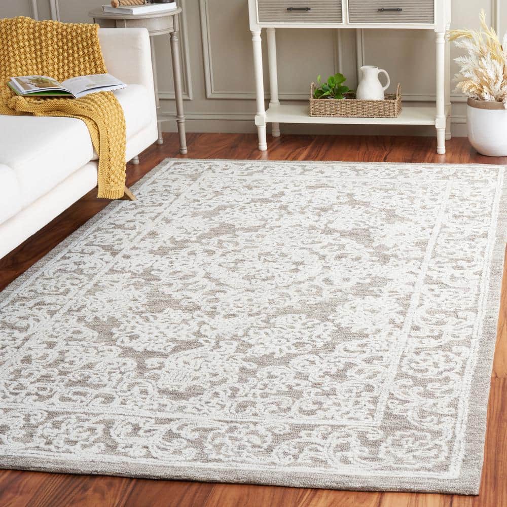 Ivory and Grey 6' x 9' Hand Tufted Wool Area Rug