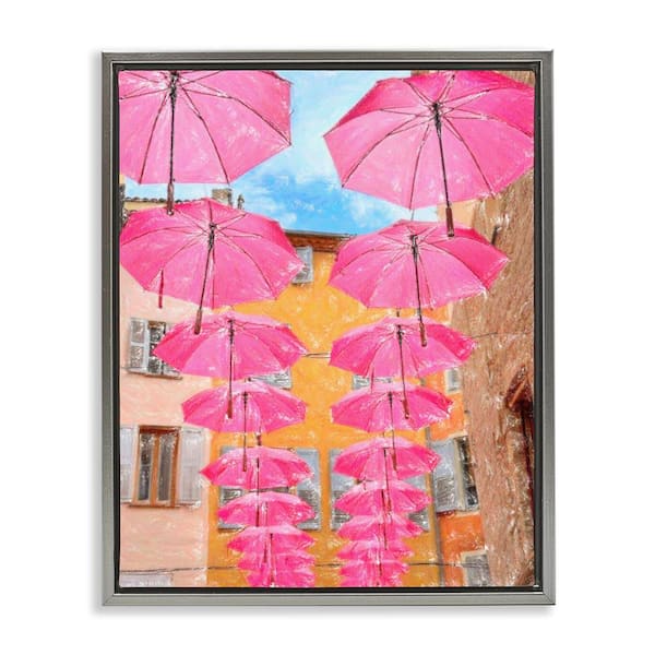 Stupell Industries Pink Umbrellas in Town by Graffi Tee Studios Gray Floater Frame Architecture Graphic Art Print 21 in. x 17 in.