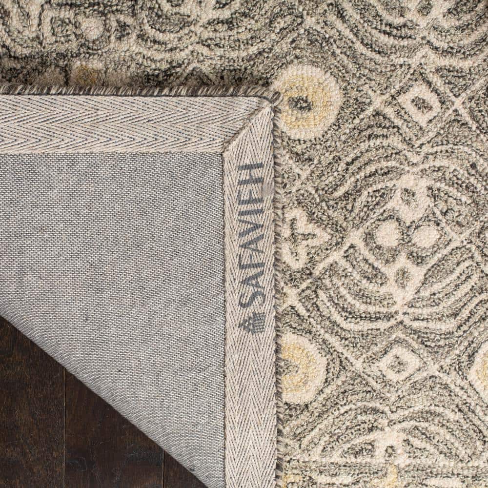 Artisan Ivory Wool 59" Hand-Tufted Round Area Rug