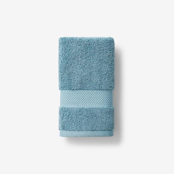 https://images.thdstatic.com/productImages/b56e13bb-730f-4f9d-98ae-1b58fceb964c/svn/shore-blue-the-company-store-bath-towels-vj94-hand-shorebl-64_600.jpg