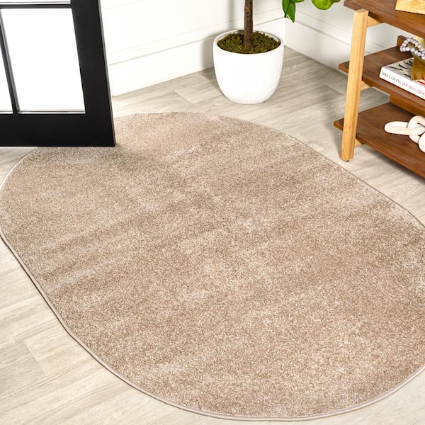 Haze Solid Low-Pile Beige 5 ft. x 8 ft. Oval Area Rug