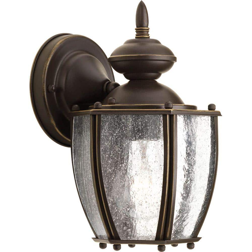 Roman Coach Collection 1-Light Antique Bronze Clear Seeded Glass Traditional Outdoor Small Wall Lantern Light price history on PriceWatchPro