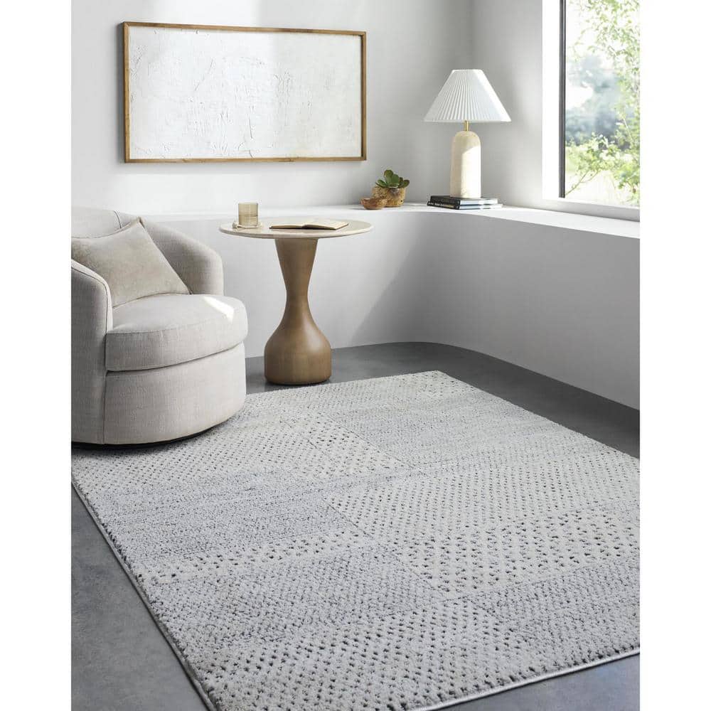 Livabliss 8' x 10' Ivory and Black Synthetic Patchwork Area Rug