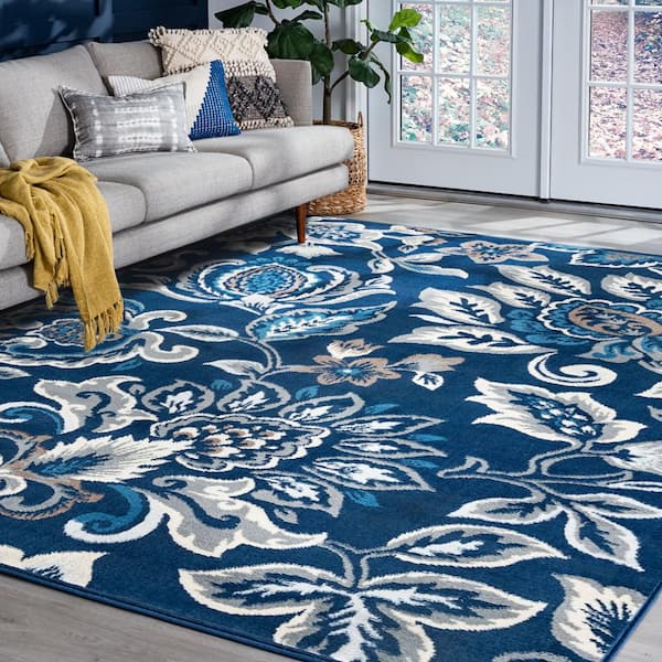 https://images.thdstatic.com/productImages/b5dfd61c-9fe1-5838-828c-3c98c952a69f/svn/dark-blue-tayse-rugs-area-rugs-mdn4207-8x10-76_600.jpg