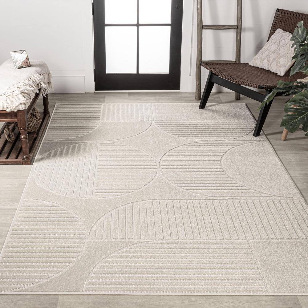 Ivory and Cream Geometric High-Low 8' x 10' Area Rug