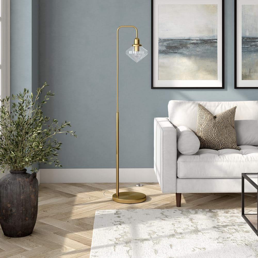 Zariza 62" Adjustable Arc Floor Lamp with Glass Globe Shade in Brass