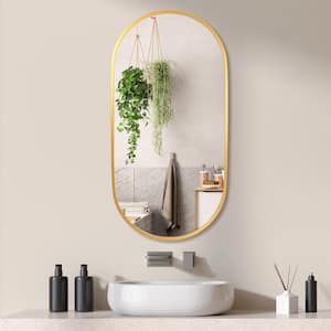 Modern 36 in. W x 18 in. H Small Oval Steel Framed Vertical/Horizontal Wall Bathroom Vanity Mirror in Gold