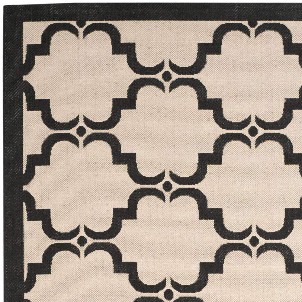 Reversible Beige/Black Synthetic 8'x11' Indoor/Outdoor Rug
