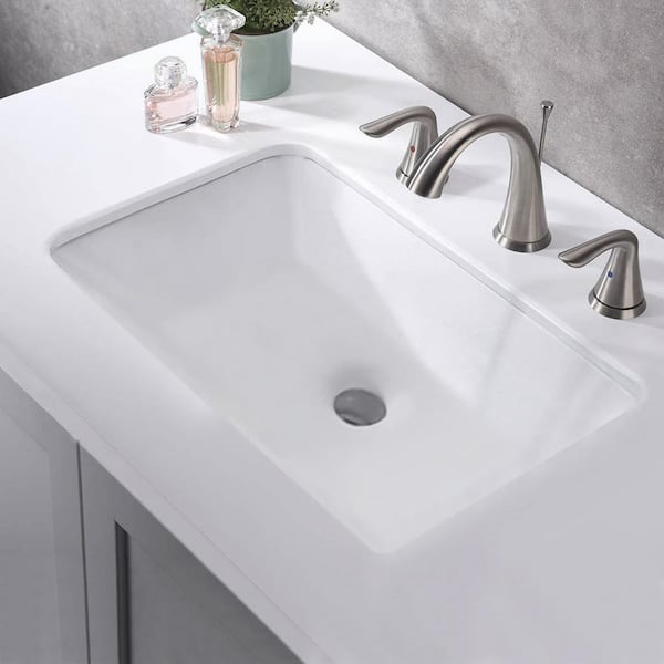 https://images.thdstatic.com/productImages/b62744cb-2b0f-4b47-a15a-29191d27746f/svn/white-proox-undermount-bathroom-sinks-pr-rp525p-4f_600.jpg