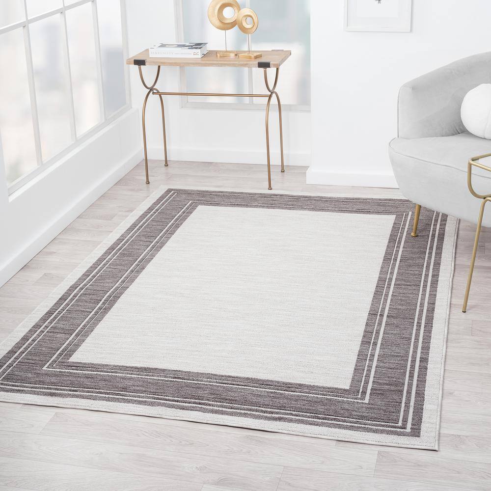 Winona 5' x 7' Ivory Rectangular Synthetic Area Rug