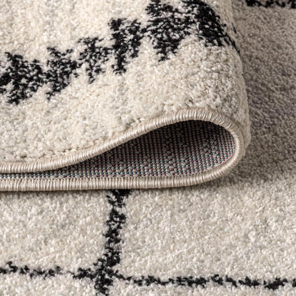 Zaina 8' x 10' Black and Cream Geometric Synthetic Area Rug