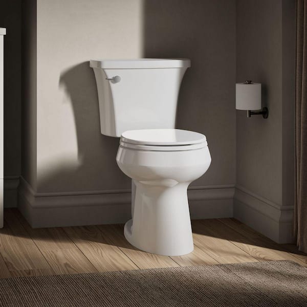 Highline Arc 10 in. Rough In 2-Piece 1.28 GFP Single Flush Round Chair Height Toilet in White with Soft Close Seat