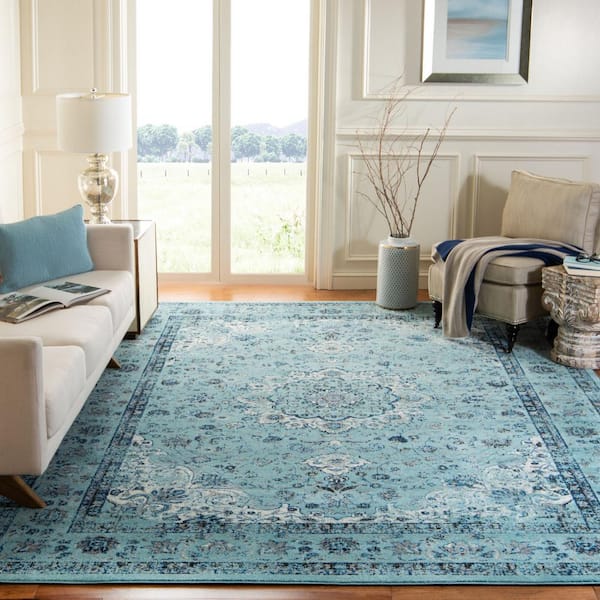 Evoke 9 ft. x 12 ft. Light Blue Border Area Rug