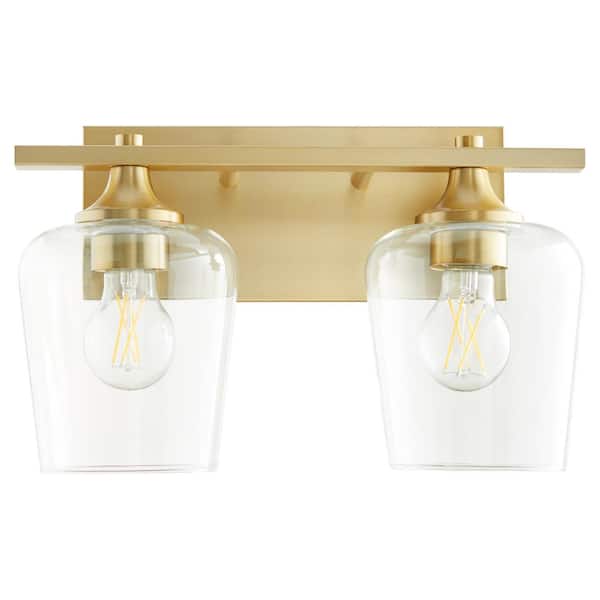 Quorum International Veno 2-Light - 100-Watt Medium Base Lamp Light Vanity 14 in. Width Vanity with 2 Clear glass Diffusers Aged Brass