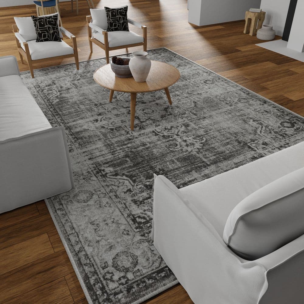 Ivory and Gray 9' x 12' Synthetic Oriental Rug