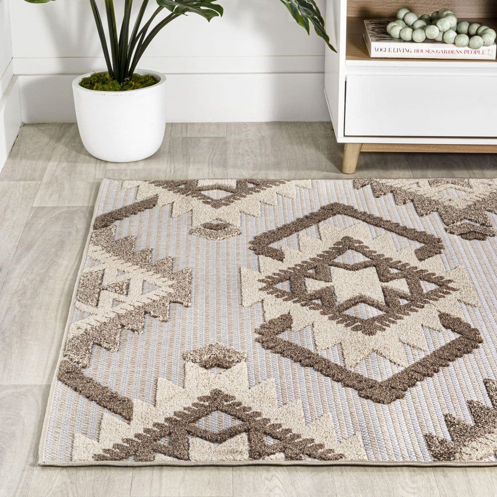 Ivory and Brown Geometric Synthetic 4' x 6' Indoor/Outdoor Rug